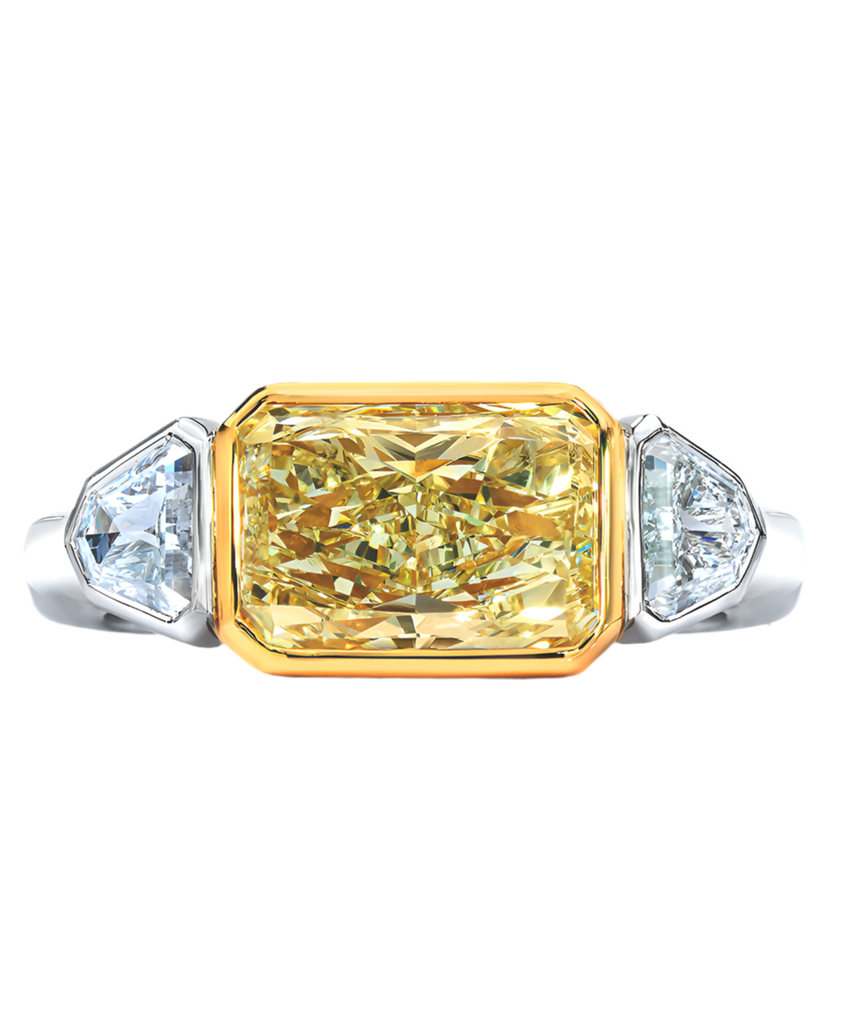 FANCY YELLOW, RADIANT AND SHIELD CUT DIAMOND RING, 18K GOLD OR PLATINUM