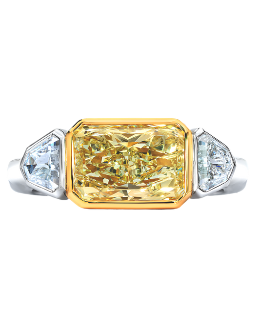 FANCY YELLOW, RADIANT AND SHIELD CUT DIAMOND RING, 18K GOLD OR PLATINUM