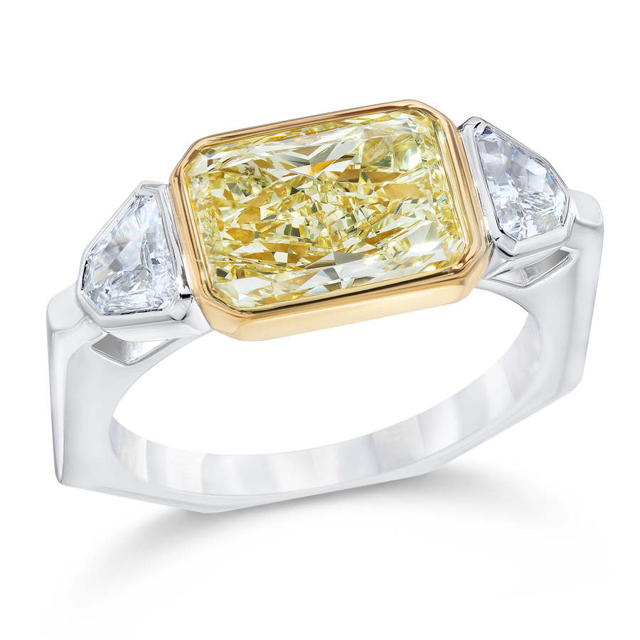 FANCY YELLOW, RADIANT AND SHIELD CUT DIAMOND RING, 18K GOLD OR PLATINUM