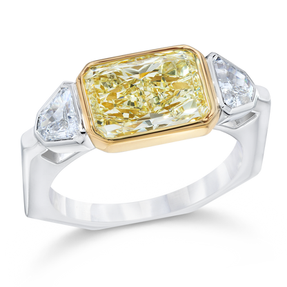 FANCY YELLOW, RADIANT AND SHIELD CUT DIAMOND RING, 18K GOLD OR PLATINUM